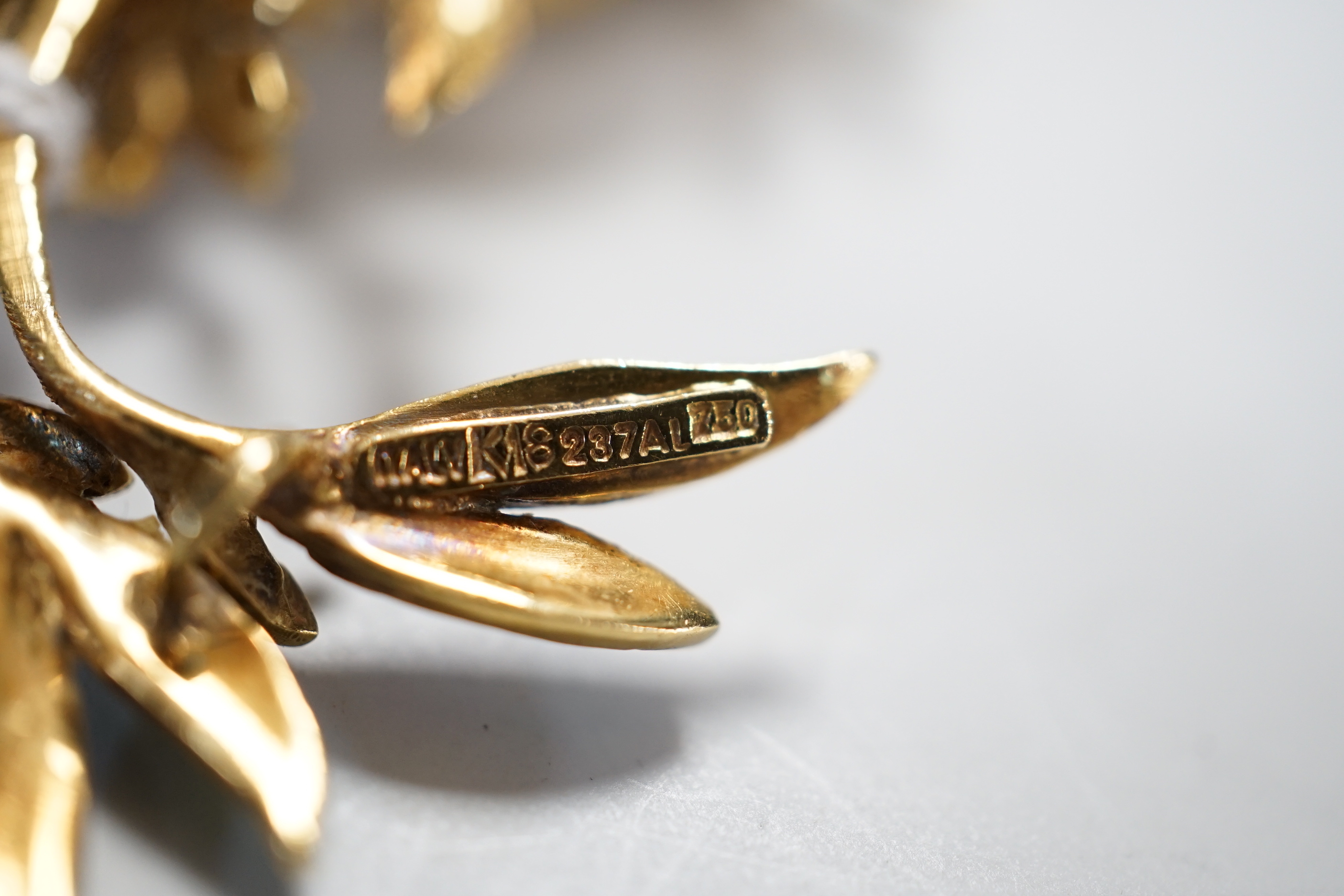 A 1960's Italian 18ct gold and polychrome enamel set exotic bird brooch, with gem set eye, 47mm, gross weight 15.7 grams.
